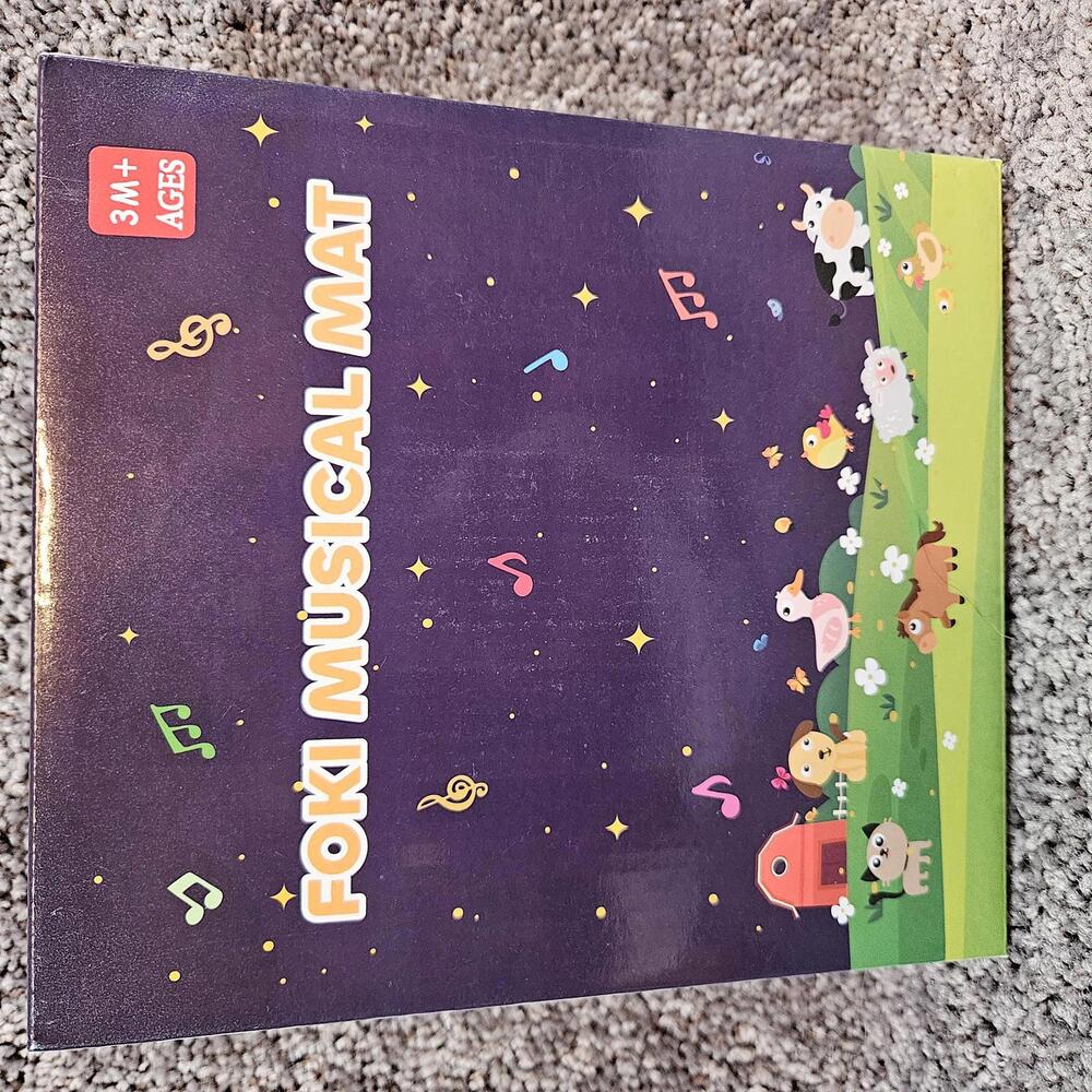 Foki musical floor mat for toddles. Battery operated. NIB